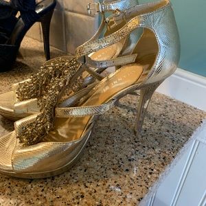 Gold high heels.  Size 6.5